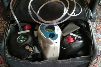 Three pieces of heavy oxygen equipment in the Rollz Flex bag