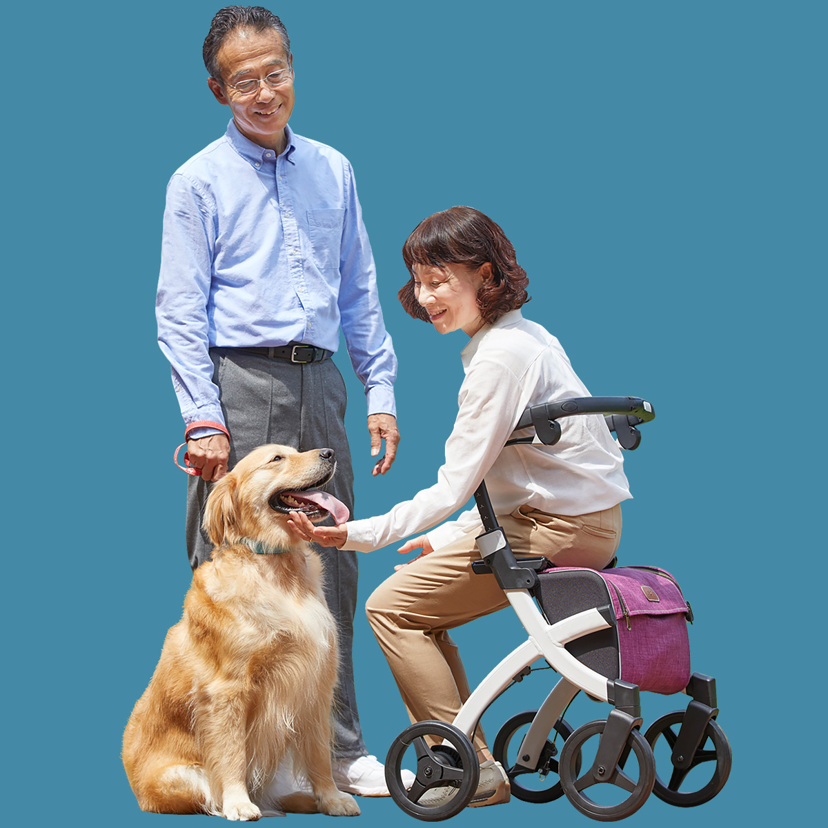 A woman sitting on a Rollz Flex rollator and petting her dog